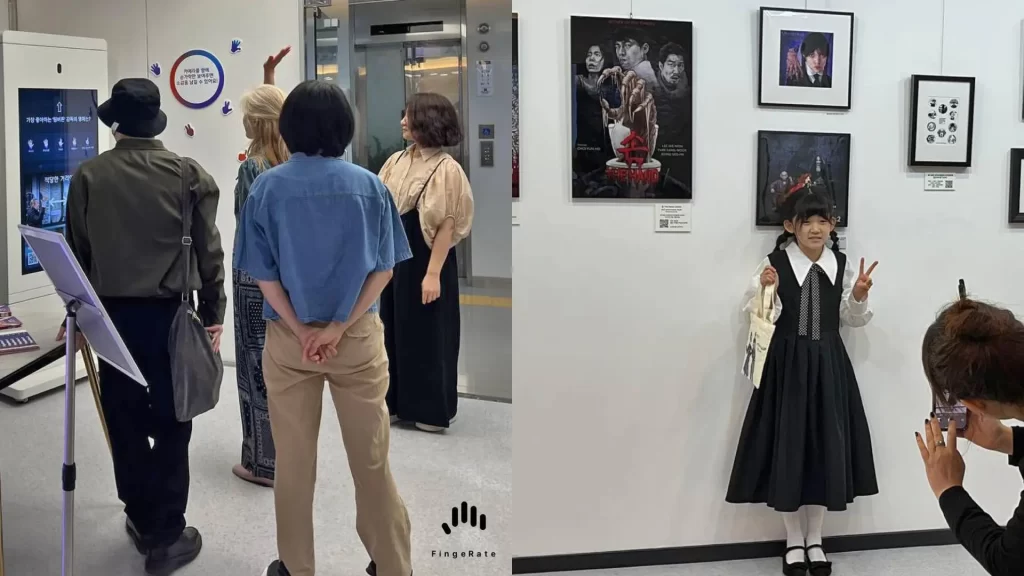 A group of people, including Eunbong, attending the third exhibition FingeRate X